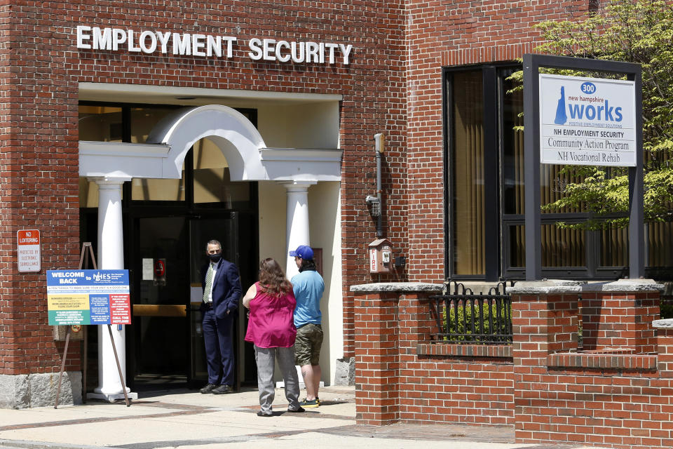 Job seekers line up outside the New Hampshire Works employment security job center, Monday, May 10, 2021, in Manchester, N.H. States are pushing the unemployed to get back to work to help businesses large and small find the workers they need to emerge from the COVID-19 recession. Now some states are reinstating a requirement that anyone who collects unemployment must look for work. (AP Photo/Mary Schwalm)