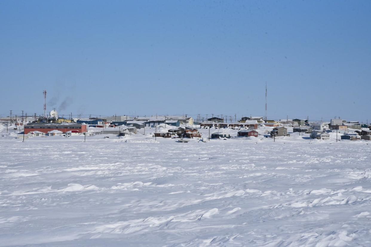 Cambridge Bay, Nunavut, is shown in April 2019 in this CBC file photo. Thanks in part to federal funding announced Tuesday, the community will be the site of a new modular home factory, with products sent to communities across the territory. (Mark Hadlari/CBC - image credit)