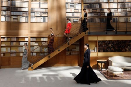 Models present creations by designer Virginie Viard as part of her Haute Couture Fall/Winter 2019/20 collection show for fashion house Chanel in Paris