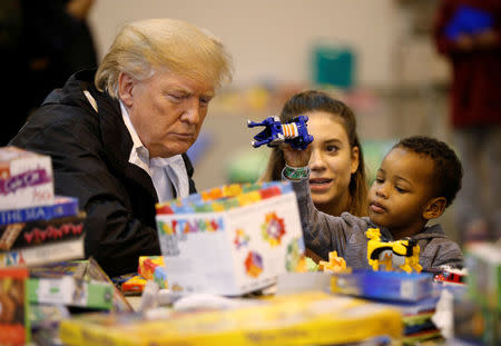 U.S. President Donald Trump visits with survivors of Hurricane Harvey at a relief center in Houston, Texas, U.S., September 2, 2017. REUTERS/Kevin Lamarque