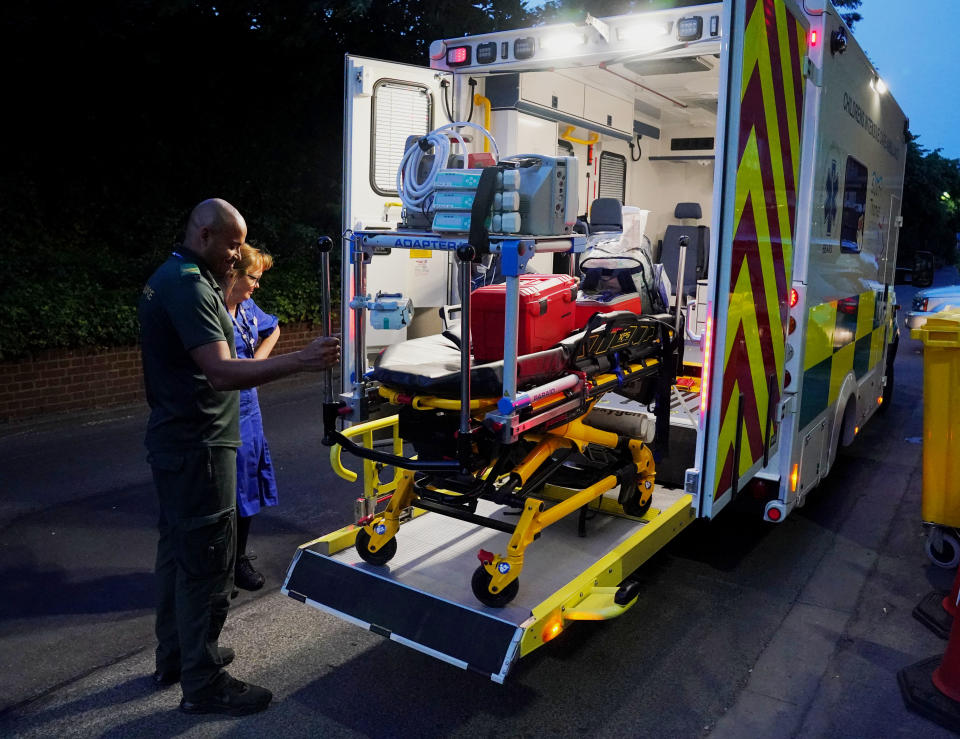 Senior Staff Nurse Jayne Farrance and Ambulance Technician Blair McMurray prepare to depart St George’s Hospital to return to Evelina Hospital after picking up a young patient (Jonathan Brady/PA)