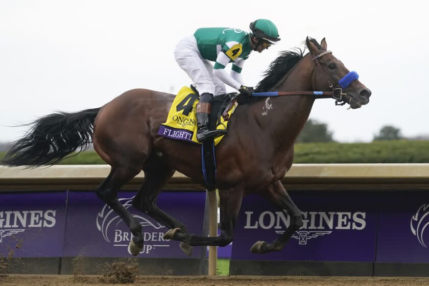 Flavien Prat rides Flightline to victory during the Breeders' Cup Classic raceat the Keenelend Race Course.