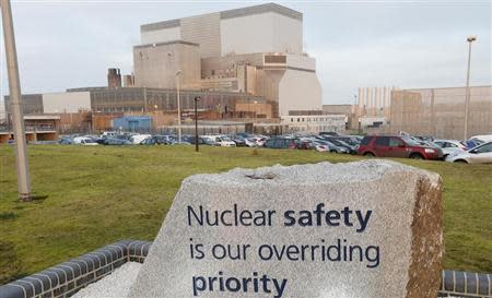 A sign is seen outside Hinkley Point B Power Station in Bridgwater, southwest England in this file photograph dated December 13, 2012. REUTERS/Suzanne Plunkett/Files