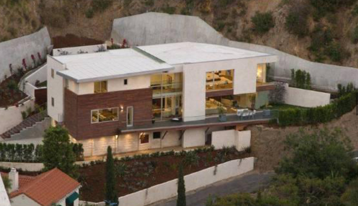 Hugh Hefner bought his wife this mansion