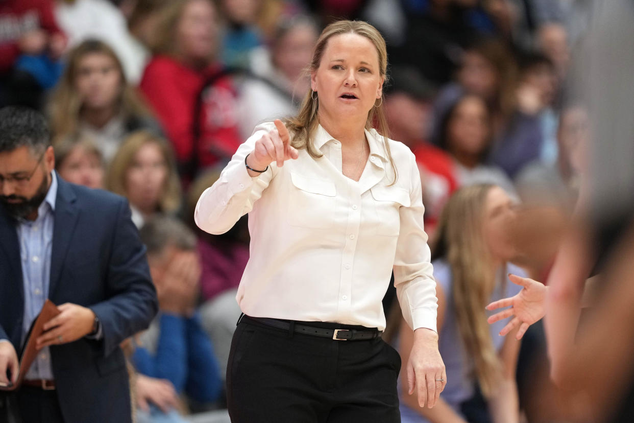 Utah head coach Lynne Roberts gestures during the fourth quarter against the Stanford Cardinal at Maples Pavilion.