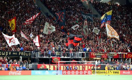 Dec 8, 2018; Atlanta, GA, USA; Atlanta United FC fans wave flags in the second half against the Portland Timbers in the 2018 MLS Cup championship game at Mercedes-Benz Stadium. Mark J. Rebilas-USA TODAY Sports