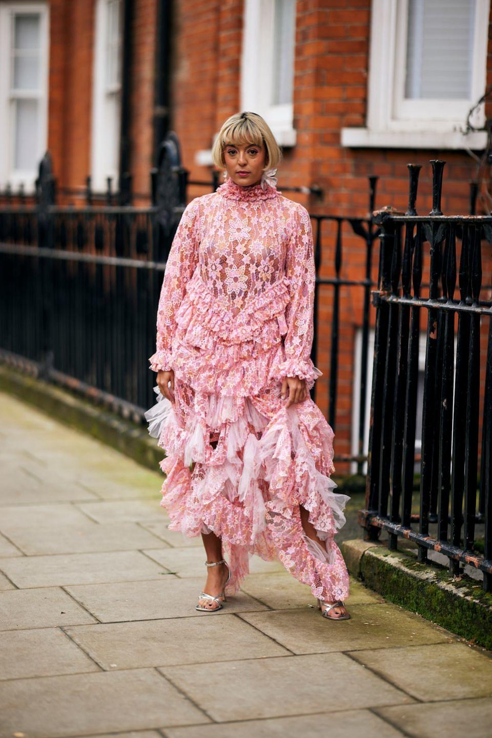 a person wearing a pink dress