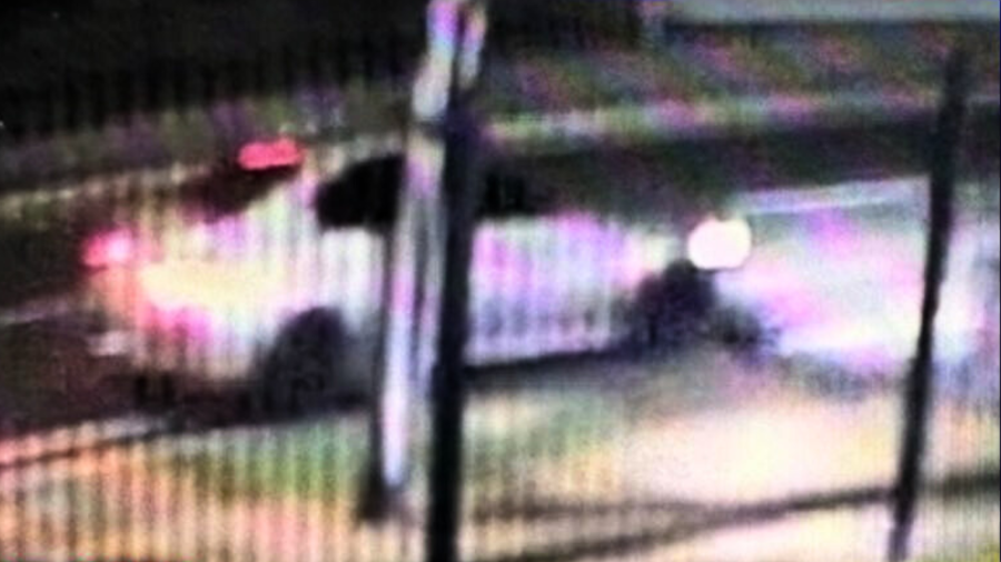 The suspect’s vehicle seen in a photo from a surveillance camera. The shooter is wanted for causing over $20,000 worth of damage at Mater Dei High School on Dec. 4, 2023. (Santa Ana Police Department)