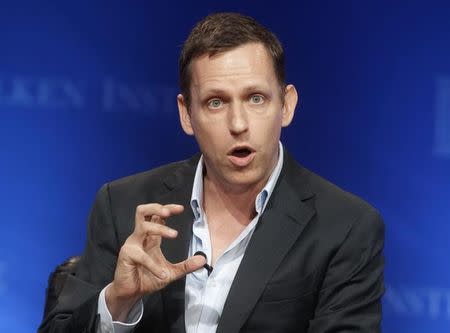 Peter Thiel, partner of Founders Fund, speaks during the panel discussion "In Tech We Trust? A Debate with Peter Thiel and Marc Andreessen" at the Milken Institute Global Conference in Beverly Hills, California April 29, 2013. REUTERS/Fred Prouser/Files