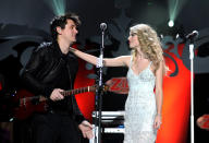 Swift quickly moved on to a short-lived relationship with fellow musician (and well-known ladies' man) John Mayer. She showed some affection for the "Your Body Is a Wonderland" singer – who's 13 years her senior – during their performance together at New York's Jingle Ball in December 2009. (12/11/2009)