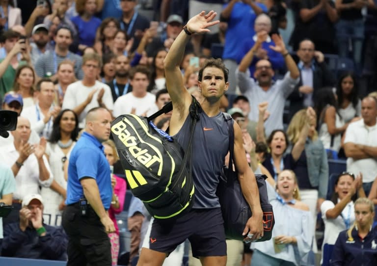 Injured: Rafael Nadal after retiring from his US Open semi-final against Juan Martin del Potro