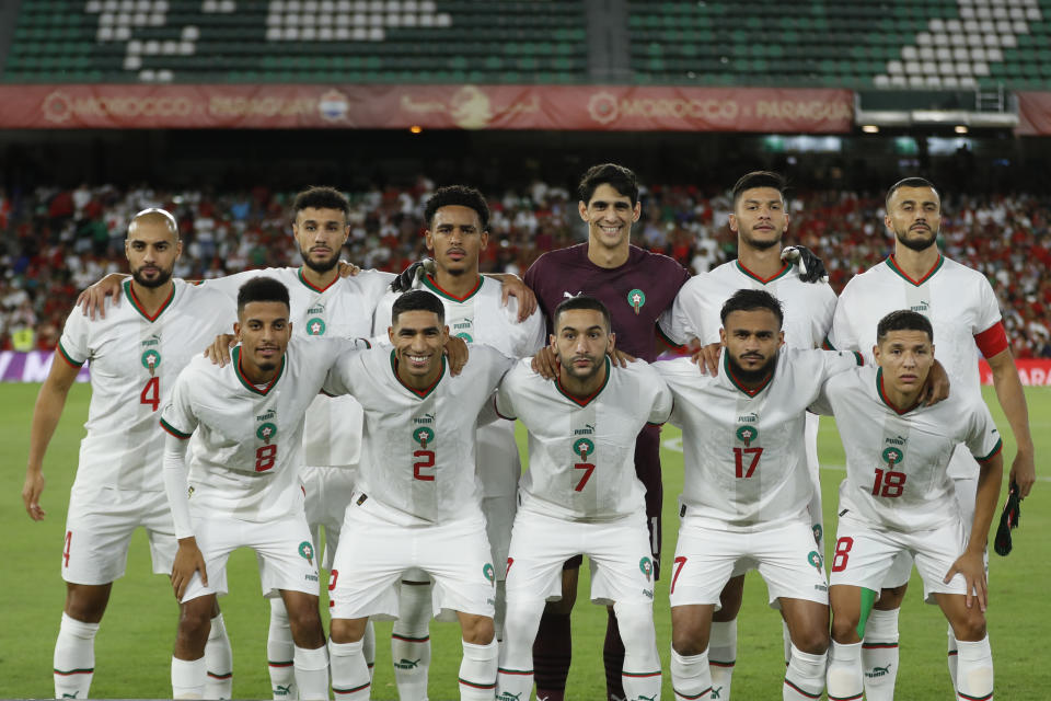 The Moroccan national soccer team players pose for photos before the international friendly soccer match between Paraguay and Morocco at the Benito Villamarin stadium in Seville, Spain, Tuesday, Sept. 27, 2022. (AP Photo/Toni Rodriguez)