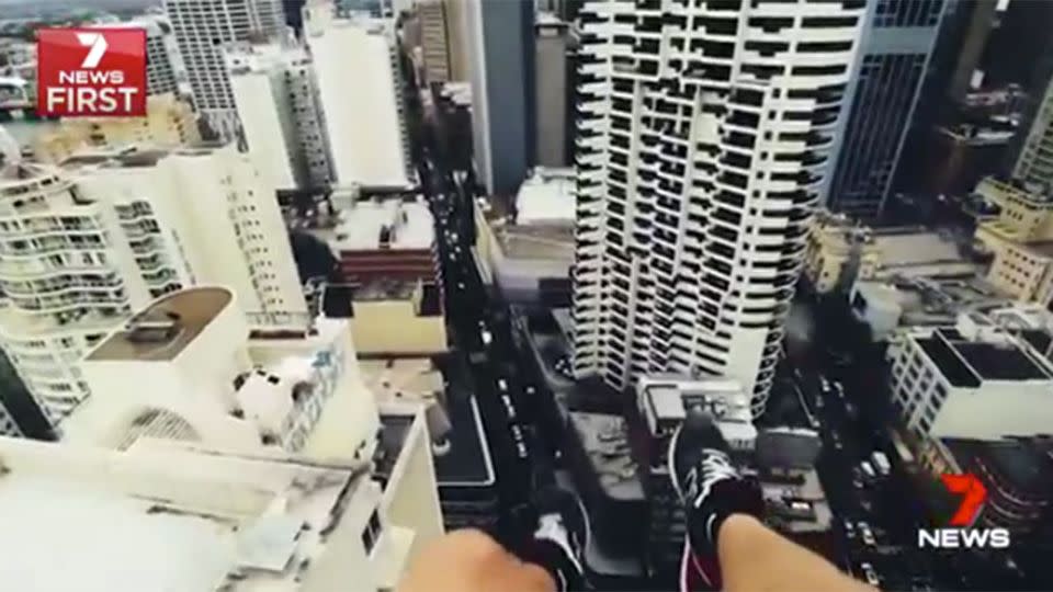 Don't look down: Thrill-seekers are risking their lives, in a bid to take an extreme picture. Source: 7 News