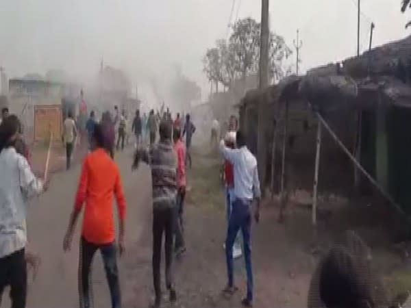 The visuals available from the spot show BJP workers throwing stones and destroying vehicles. (Photo: ANI)