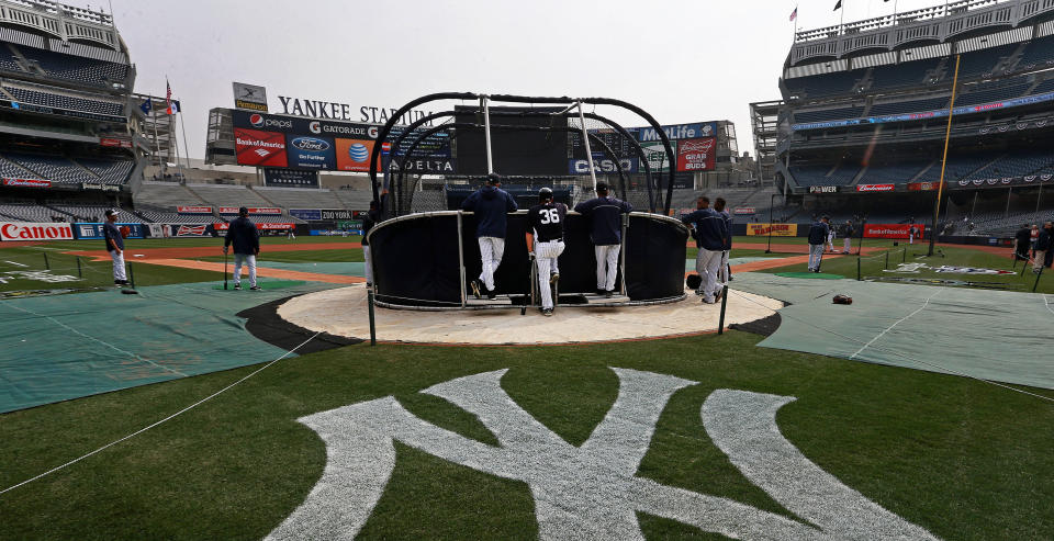 The Yankees made history by hiring a women as a full-time hitting coach. (Photo by Jim Davis/The Boston Globe via Getty Images)