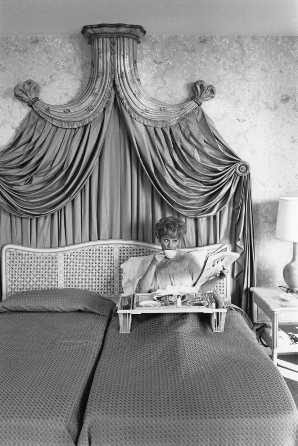 1955: Enjoying breakfast in bed in her New York City home