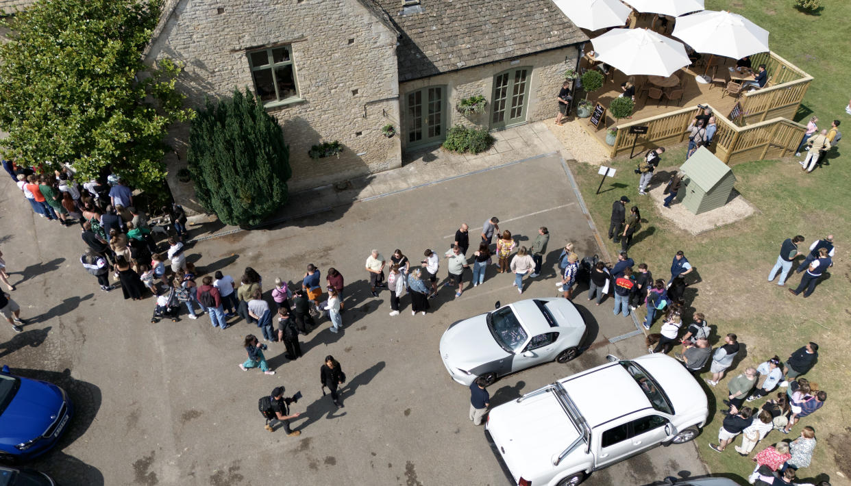 People queuing outside at the opening of Jeremy Clarkson's new pub, The Farmer's Dog