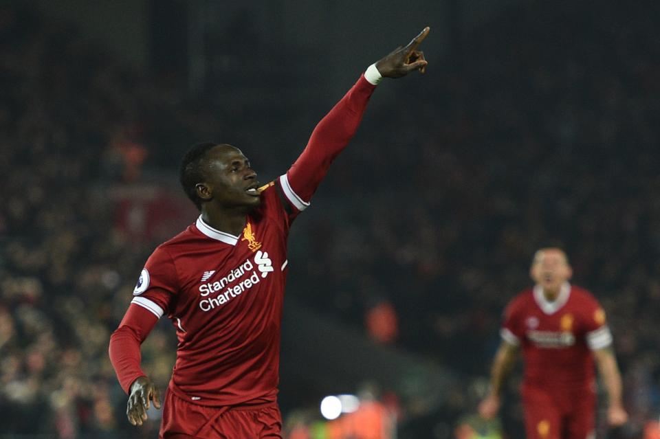 Sadio Mane celebrates his goal for Liverpool against Manchester City. (Getty)