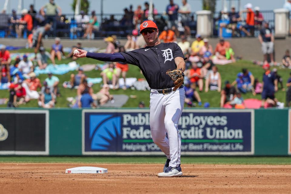 Detroit Tigers second baseman Colt Keith (33) throws to first during the third inning against the New York Mets at Publix Field at Joker Marchant Stadium on Thursday, March 21, 2024, in Lakeland, Florida.