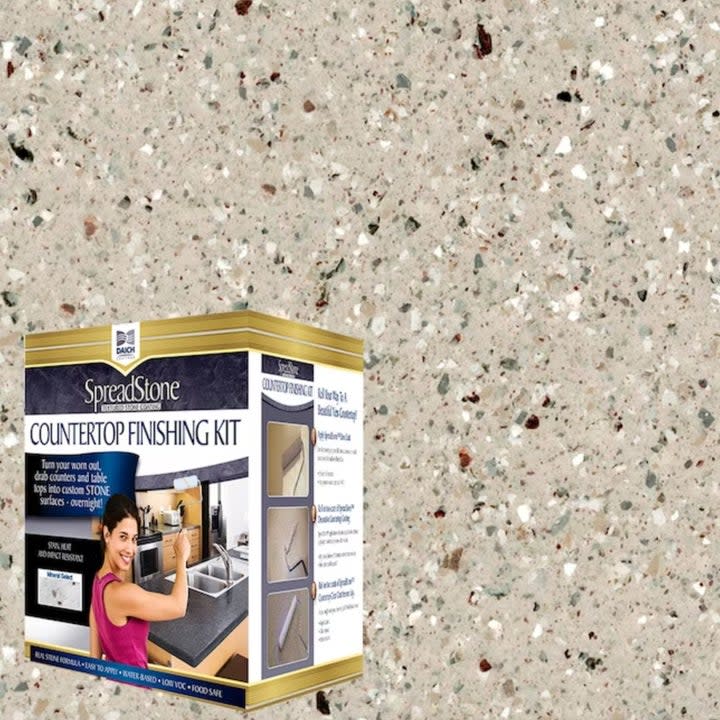the kit packaging overlaid on a close-up of the light brown stone finish of the kit