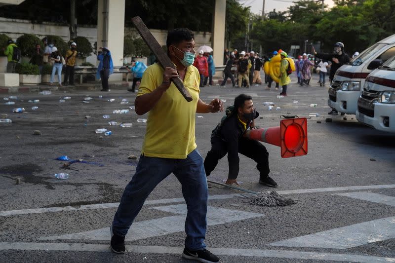 Royalists clash with pro-democracy protesters during an anti-government protest in Bangkok