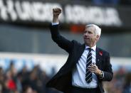 Newcastle United's manager Alan Pardew celebrates after their English Premier League soccer match against Tottenham Hotspur at White Hart Lane in London, November 10, 2013.