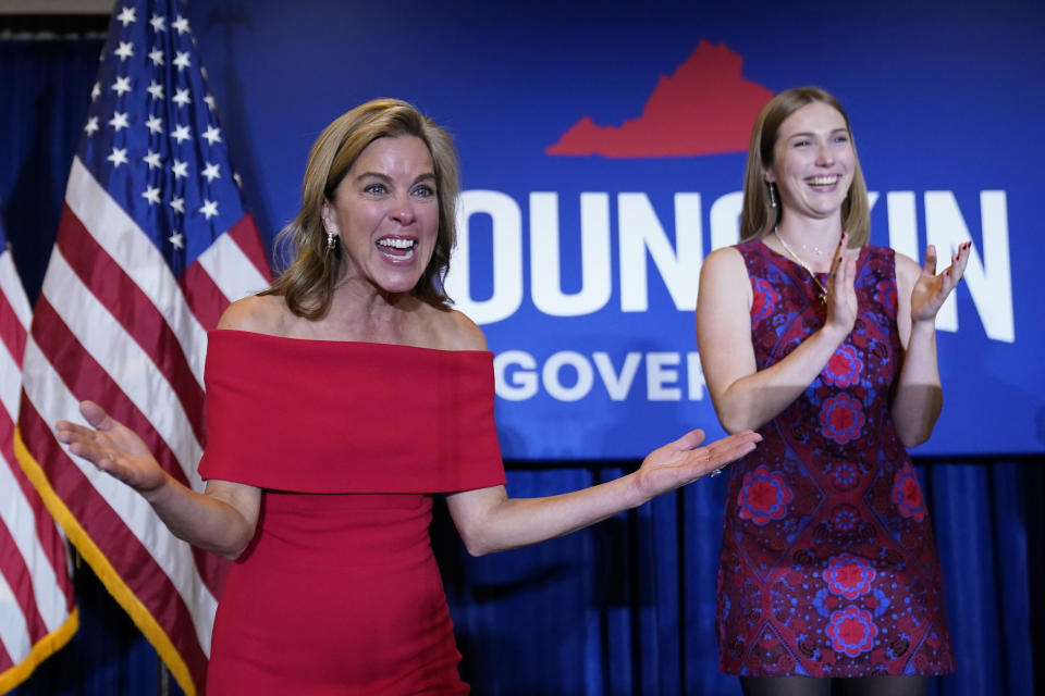 Suzanne Youngkin reacts on stage before Virginia Gov.-elect Glenn Youngkin speaks at an election night party in Chantilly, Va., early Wednesday, Nov. 3, 2021, after he defeated Democrat Terry McAuliffe. At right is their daughter Anna.(AP Photo/Andrew Harnik)