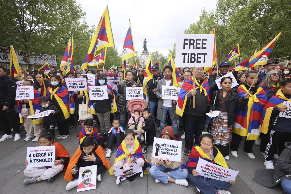 Tibetan demonstrate Sunday, May 5, 2024 in Paris. French President Emmanuel Macron is welcoming China's Xi Jinping for a two-day state visit to France Monday May 6. The state visit marks the 60th anniversary of diplomatic relations between the two countries and follows Macron's trip to China in April 2023. (AP Photo/Thomas Padilla)