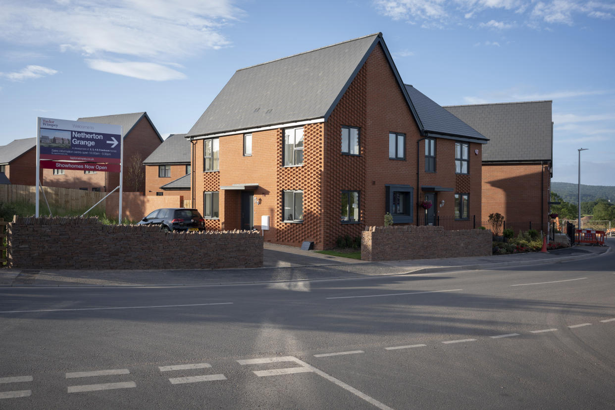 A semi-completed housing estate on former farmland, a landscape that is fast changing to residential use by housing developer Taylor Wimpey at Netherton Grange, Youngwood Lane, Nailsea, on 7th November 2021, in Nailsea, North Somerset, England. Nearly 170 homes are being built here on the edge of Nailsea in rural North Somerset after detailed plans were approved. (Photo by Richard Baker / In Pictures via Getty Images)