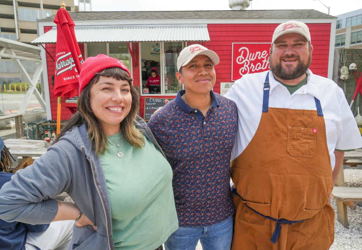 Dune Brothers owners Monica and Nick Gillespie, pictured here with new manager Jose Morales, center, will open their second business as early as July in Providence.
