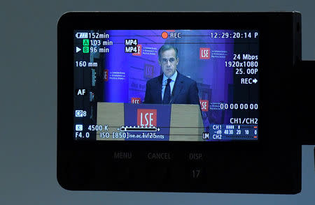 Britain's Bank of England Governor Mark Carney is seen through video camera playback screen as he delivers a speech at the London School of Economics in London, Britain, January 16, 2017. REUTERS/Toby Melville