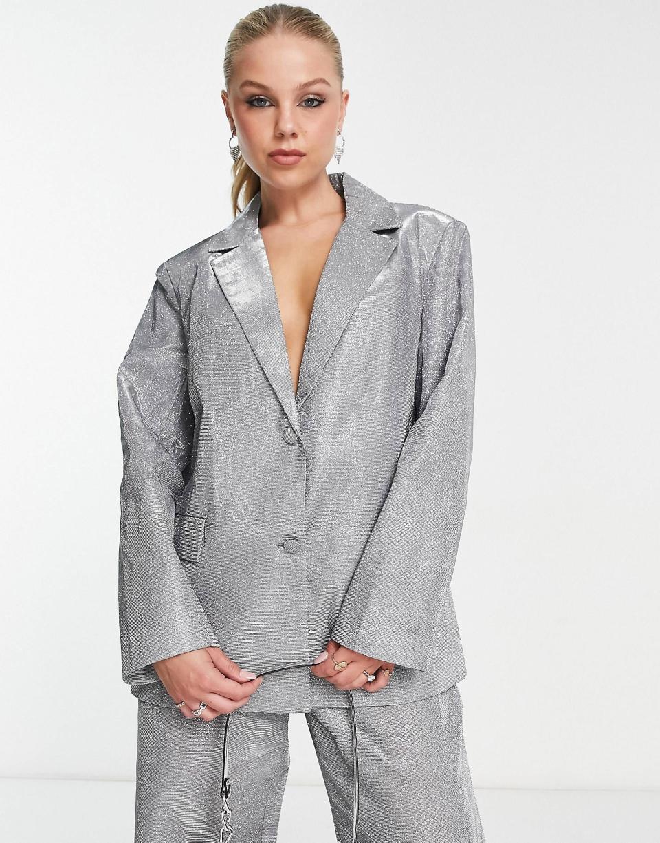 <p><a href="https://go.redirectingat.com?id=74968X1596630&url=https%3A%2F%2Fwww.asos.com%2Fus%2Fpieces%2Fpieces-premium-exclusive-oversized-glitter-blazer-in-silver-part-of-a-set%2Fprd%2F203816188&sref=https%3A%2F%2F" rel="nofollow noopener" target="_blank" data-ylk="slk:Shop Now;elm:context_link;itc:0;sec:content-canvas" class="link ">Shop Now</a></p><p>Exclusive Oversized Glitter Blazer</p><p>$148.00</p><p>us.asos.com</p>