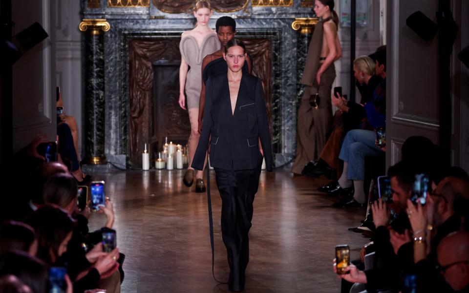 Models present creations by designer Victoria Beckham as part of her Fall-Winter 2024/2025 Women's ready-to-wear collection show during Paris Fashion Week, in Paris, France, March 1, 2024. REUTERS/Gonzalo Fuentes