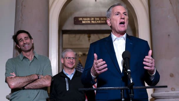 PHOTO: Speaker of the House Kevin McCarthy is joined by his top negotiators on the debt limit, Rep. Garret Graves, left, and Rep. Patrick McHenry, as he talks to reporters at the Capitol in Washington, D.C., on May 28, 2023. (J. Scott Applewhite/AP)