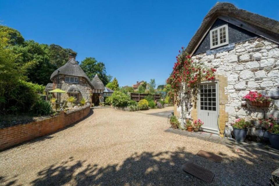 A pretty Brighstone cottage and its to-let holiday barn is for sale on the Isle of Wight. <i>(Image: BCM.)</i>