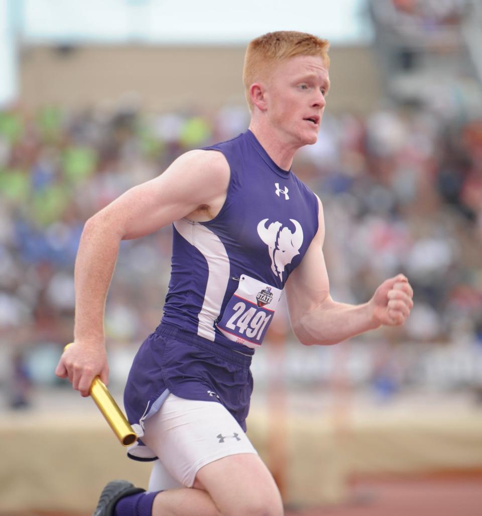 Cross Plains' Noah Moses runs the 800 relay at the state track and field meet in Austin.
