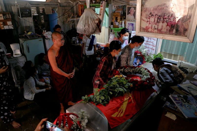 People attend the funeral of Kyaw Win Maung, who was shot and killed during a protest against the military coup, in Mandalay