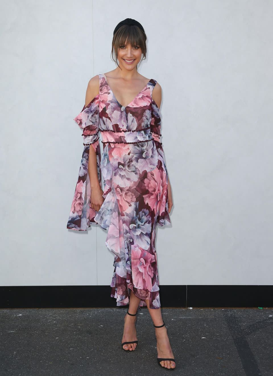 Rachael Finch embodies Oaks Day style in this floral We Ae Kindred dress. Photo: Getty