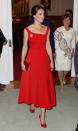 <p>The Duchess dressed diplomatically for an evening reception in Canada thanks to a red Preen dress accessorised with a maple leaf brooch. She finished the ensemble with a matching suede clutch and shoes. <em>[Photo: Getty]</em> </p>