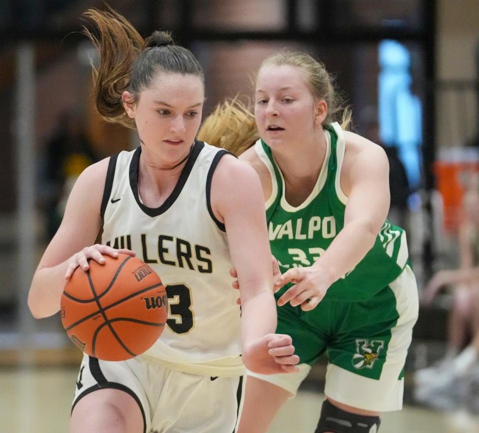 Noblesville High School's Meredith Tippner (23) works against Valparaiso High School's Becca Gerdt (33) at Noblesville High School, Dec 28, 2023. Noblesville won 65-56.