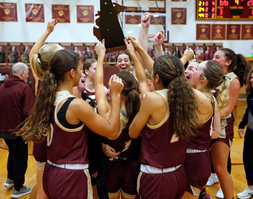 Brandywine celebrates after beating Constantine, 66-20, to win the MHSAA Division 3, District 78 girls basketball championship game Friday, March 8, 2024, at Brandywine High School in Niles.
