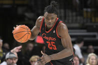 FILE - Houston forward Jarace Walker (25) pushes the ball up the court during the first half of an NCAA college basketball game against Central Florida, Wednesday, Jan. 25, 2023, in Orlando, Fla. Walker is among the top prospects in next month’s NBA draft.(AP Photo/Phelan M. Ebenhack, File)