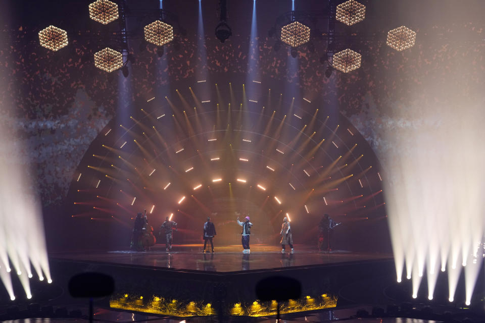 Kalush Orchestra from Ukraine singing 'Stefania' performs during the final dress rehearsal at the Eurovision Song Contest in Turin, Italy, Friday, May 13, 2022. (AP Photo/Luca Bruno)