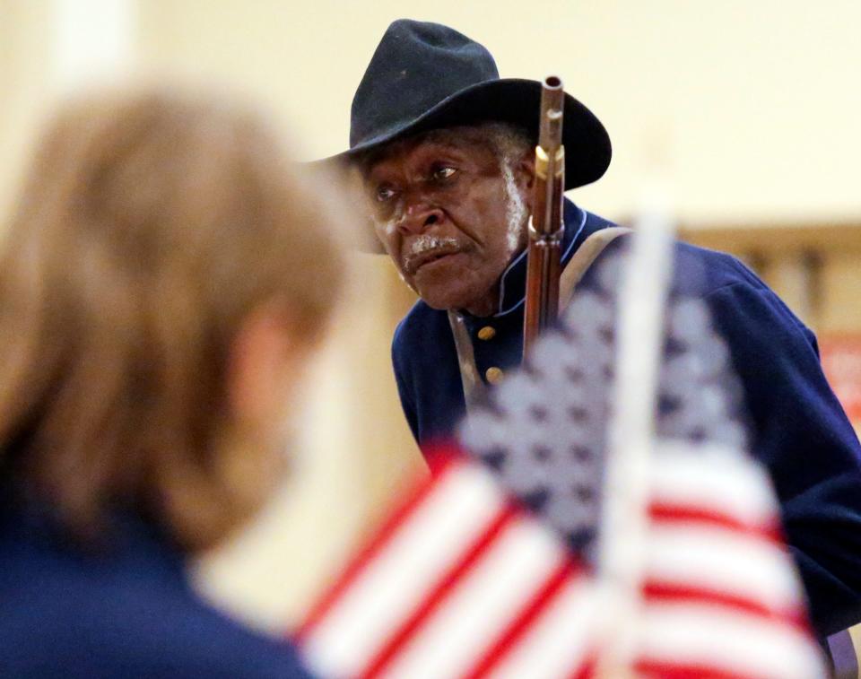 Willis Phelps portrays a US Colored Troops soldier from Delaware City during a Juneteenth history event at the Hockessin Memorial Hall Thursday, June 17, 2021.