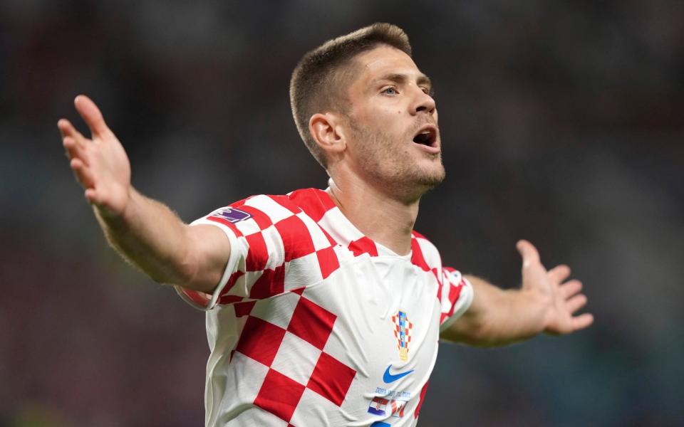 Croatia forward Andrej Kramaric (9) celebrates after scoring against Canada during the first half of the group F World Cup soccer match at the Khalifa International - Nathan Denette/AP
