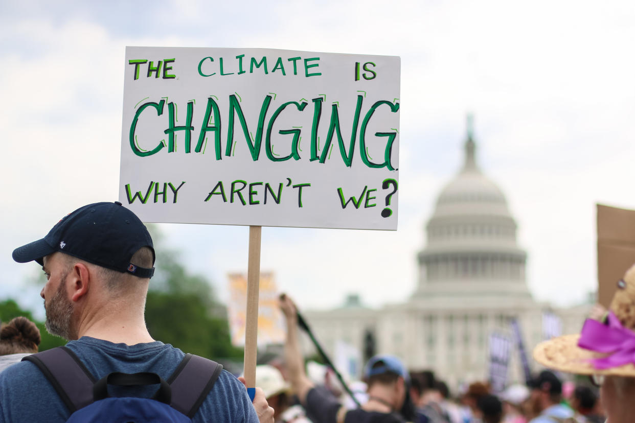 Thousands of people attend the People's Climate March to stand up against climate change in Washington, D.C. (Photo: Shutterstock/Nicole S Glass)