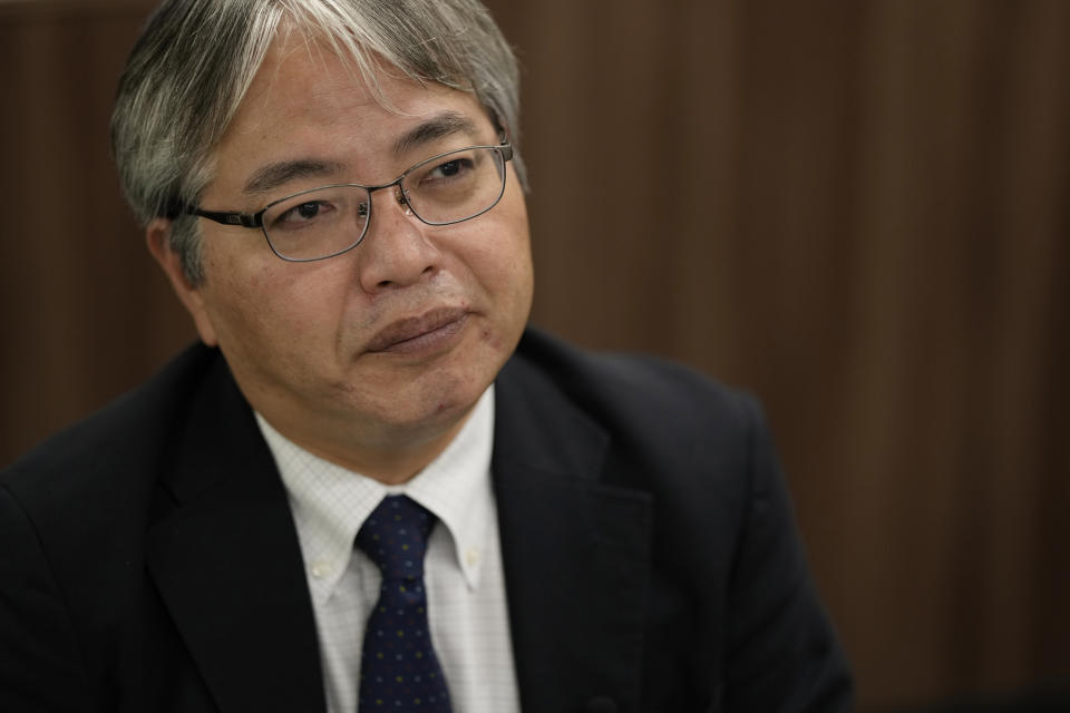 Junichi Matsumoto, an official of Tokyo Electric Power Company Holdings (TEPCO), pauses for a moment as he speaks in an interview with The Associated Press at the TEPCO headquarters in Tokyo, Friday, July 28, 2023. Matsumoto, a top official in charge of the Fukushima Daiichi nuclear power plant said an upcoming release of treated radioactive water into the sea more than 12 years after the meltdown disaster marks “a milestone,” but it's still an initial step of the daunting task of the decades-long decommissioning process that still remain. (AP Photo/Hiro Komae)