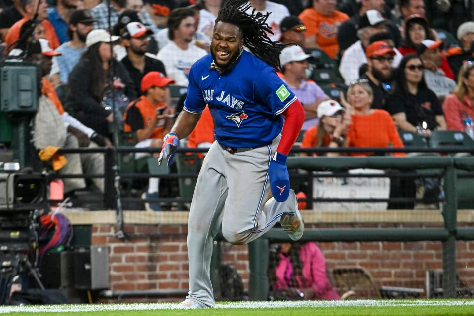 Vladimir Guerrero Jr. rounds third base to score in the Blue Jays' win over the Orioles in Baltimore.