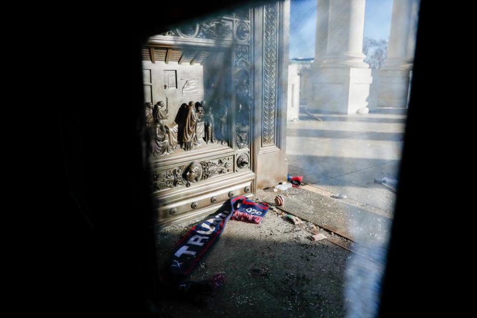 Shattered glass and debris litter the US Capitol in Washington following the 6 January attack.