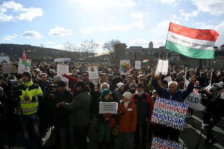 People gather outside the Hungarian Academy of Sciences to protest against government plans to weaken the institution in Budapest, Hungary, February 12, 2019. REUTERS/Tamas Kaszas